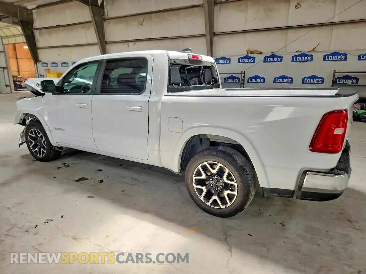 2 Photograph of a damaged car 1C6SRFJP4TN368998 RAM 1500 2026