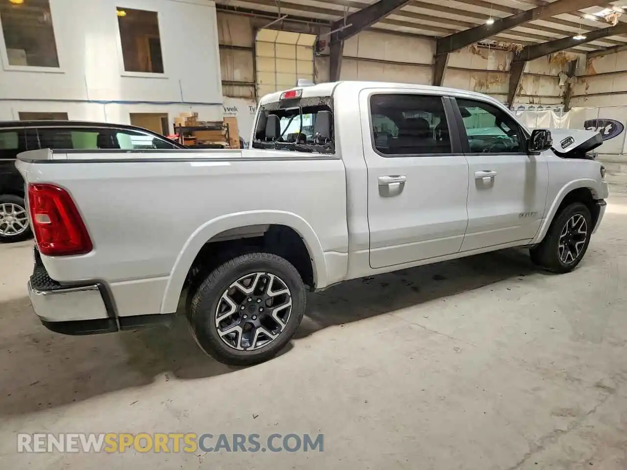 3 Photograph of a damaged car 1C6SRFJP4TN368998 RAM 1500 2026
