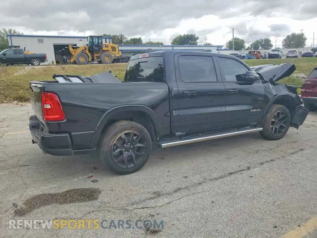 3 Photograph of a damaged car 1C6SRFJP5TN394803 RAM 1500 2026
