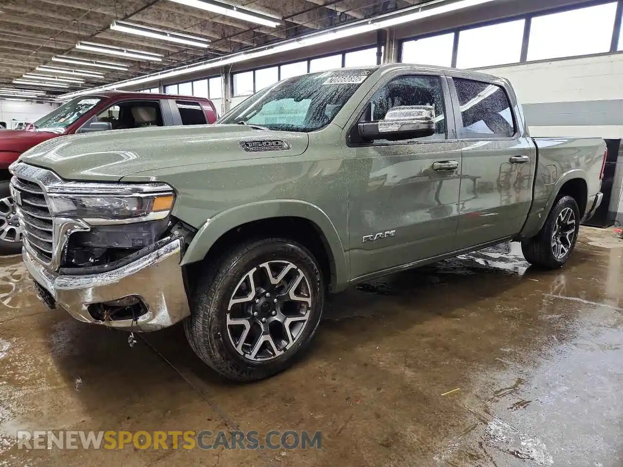 1 Photograph of a damaged car 1C6SRFJP7TN289468 RAM 1500 2026