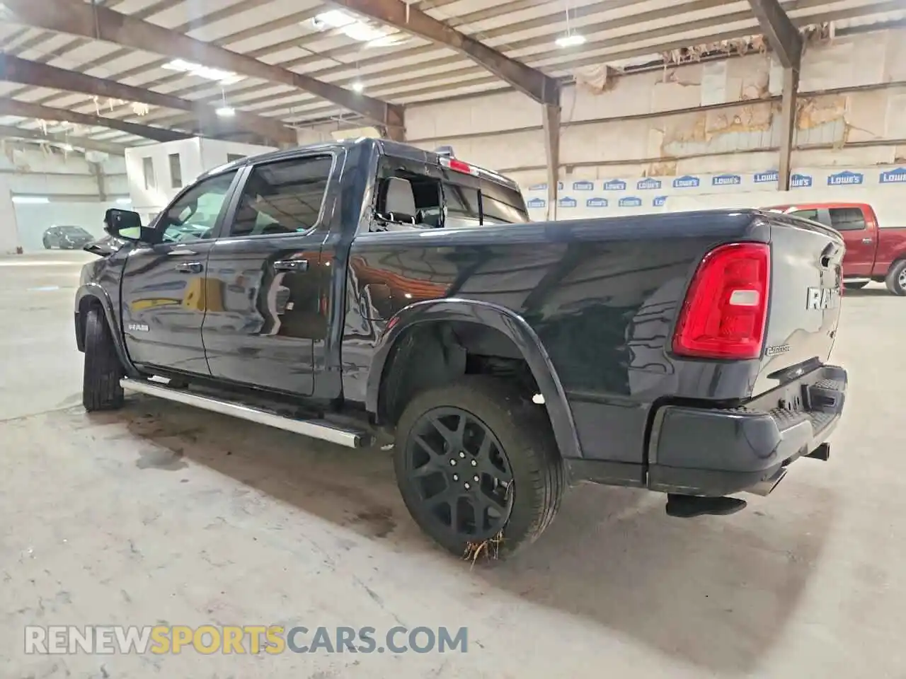 2 Photograph of a damaged car 1C6SRFJP9TN376885 RAM 1500 2026