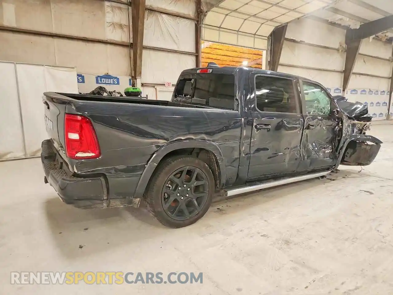 3 Photograph of a damaged car 1C6SRFJP9TN376885 RAM 1500 2026