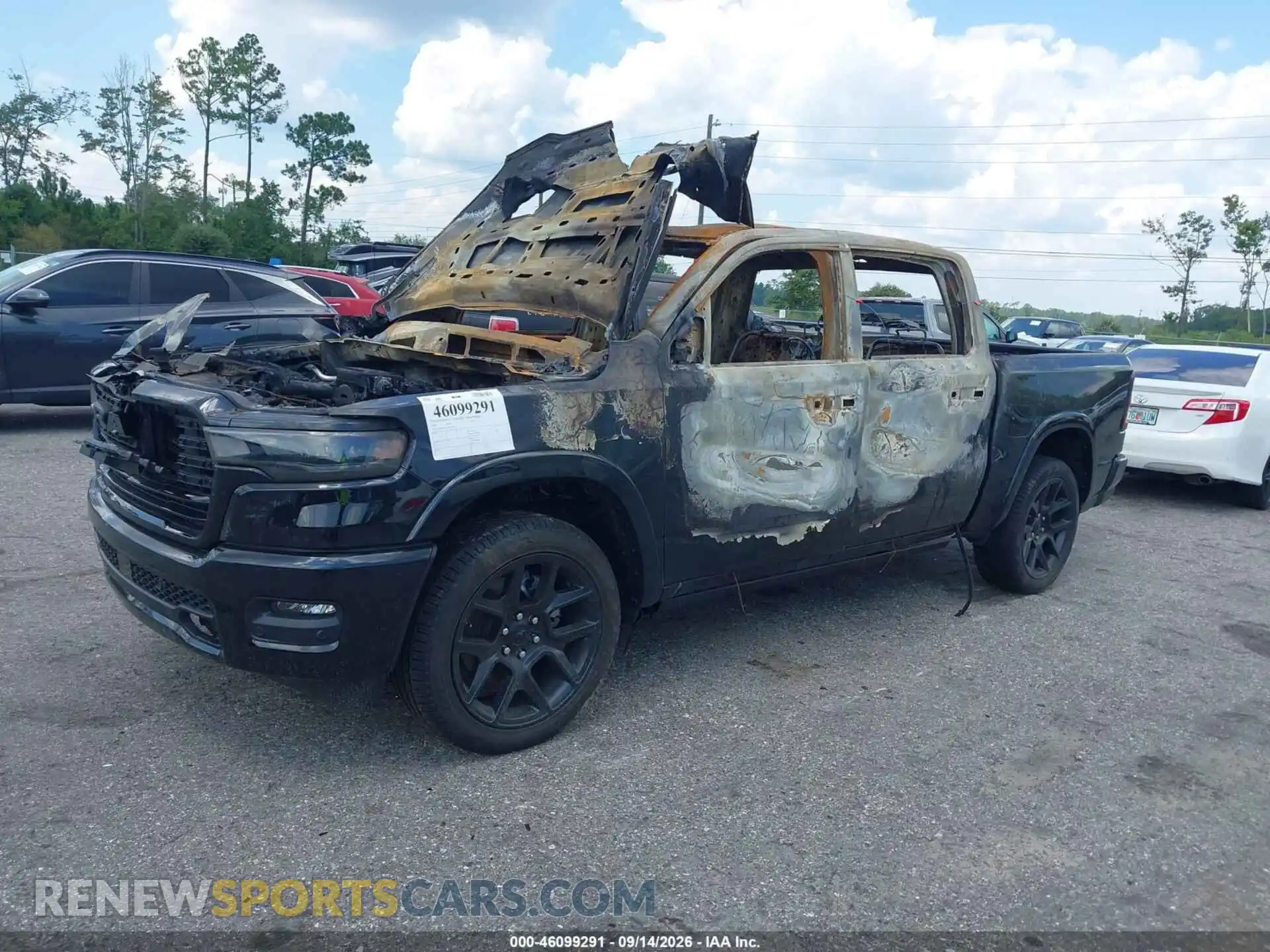 2 Photograph of a damaged car 1C6SRFJT3TN357567 RAM 1500 2026
