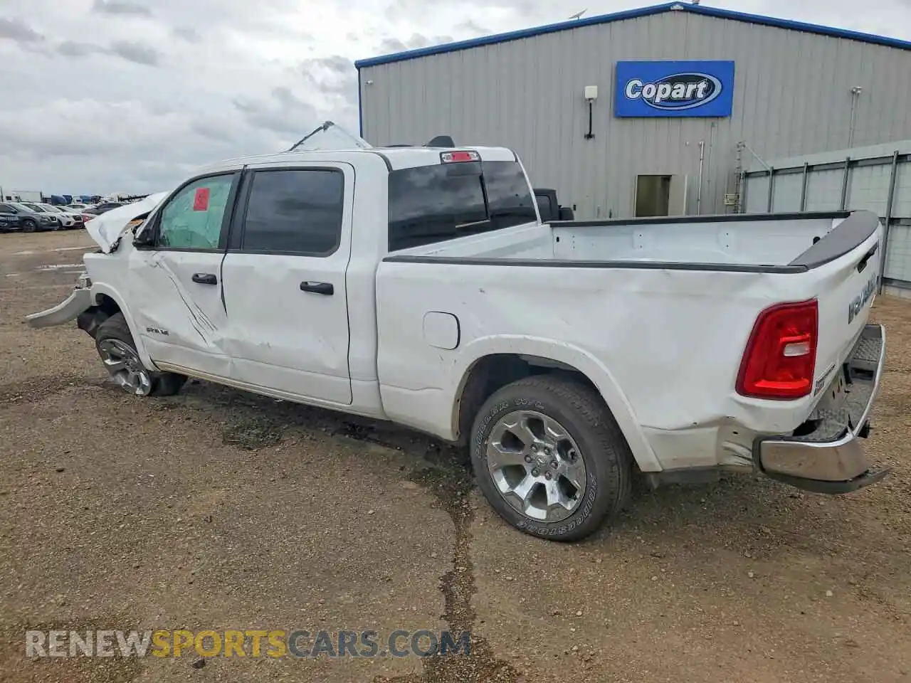 2 Photograph of a damaged car 1C6SRFMP6TN406064 RAM 1500 2026