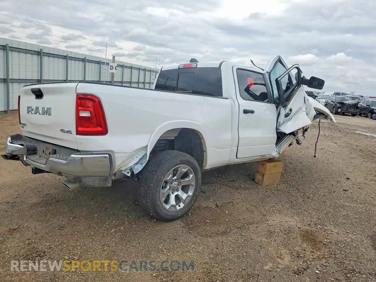 3 Photograph of a damaged car 1C6SRFMP6TN406064 RAM 1500 2026