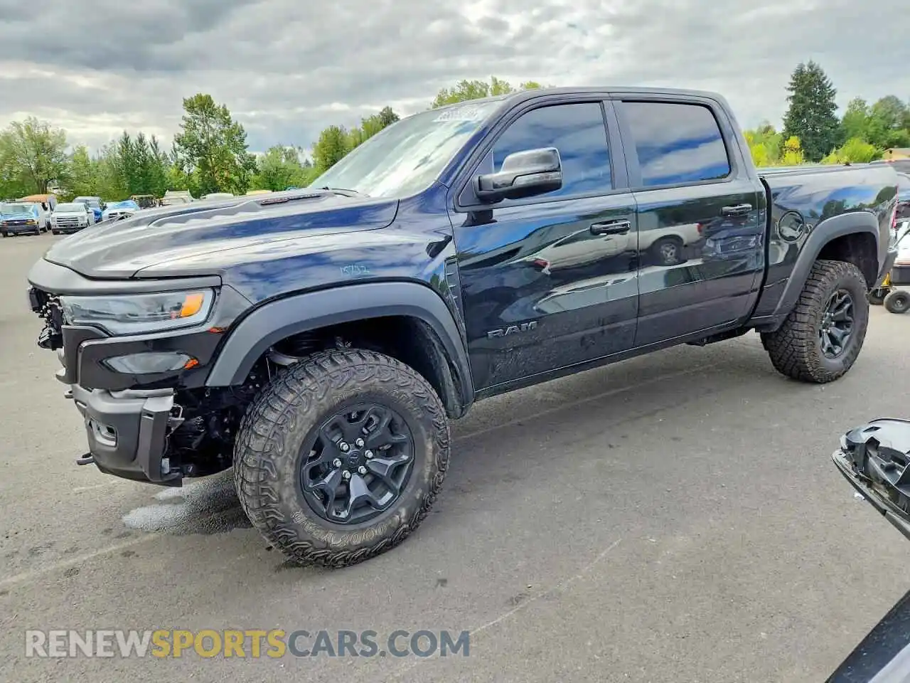 1 Photograph of a damaged car 1C6SRFUP2TN260584 RAM 1500 2026