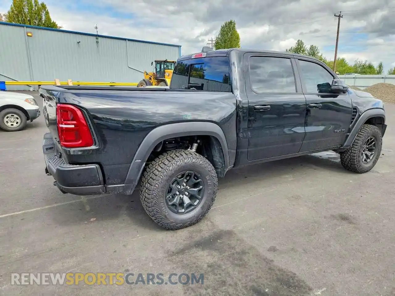 3 Photograph of a damaged car 1C6SRFUP2TN260584 RAM 1500 2026