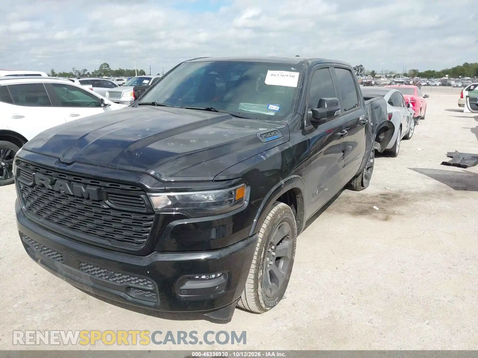 2 Photograph of a damaged car 3C6RREFG0T4187781 RAM 1500 2026