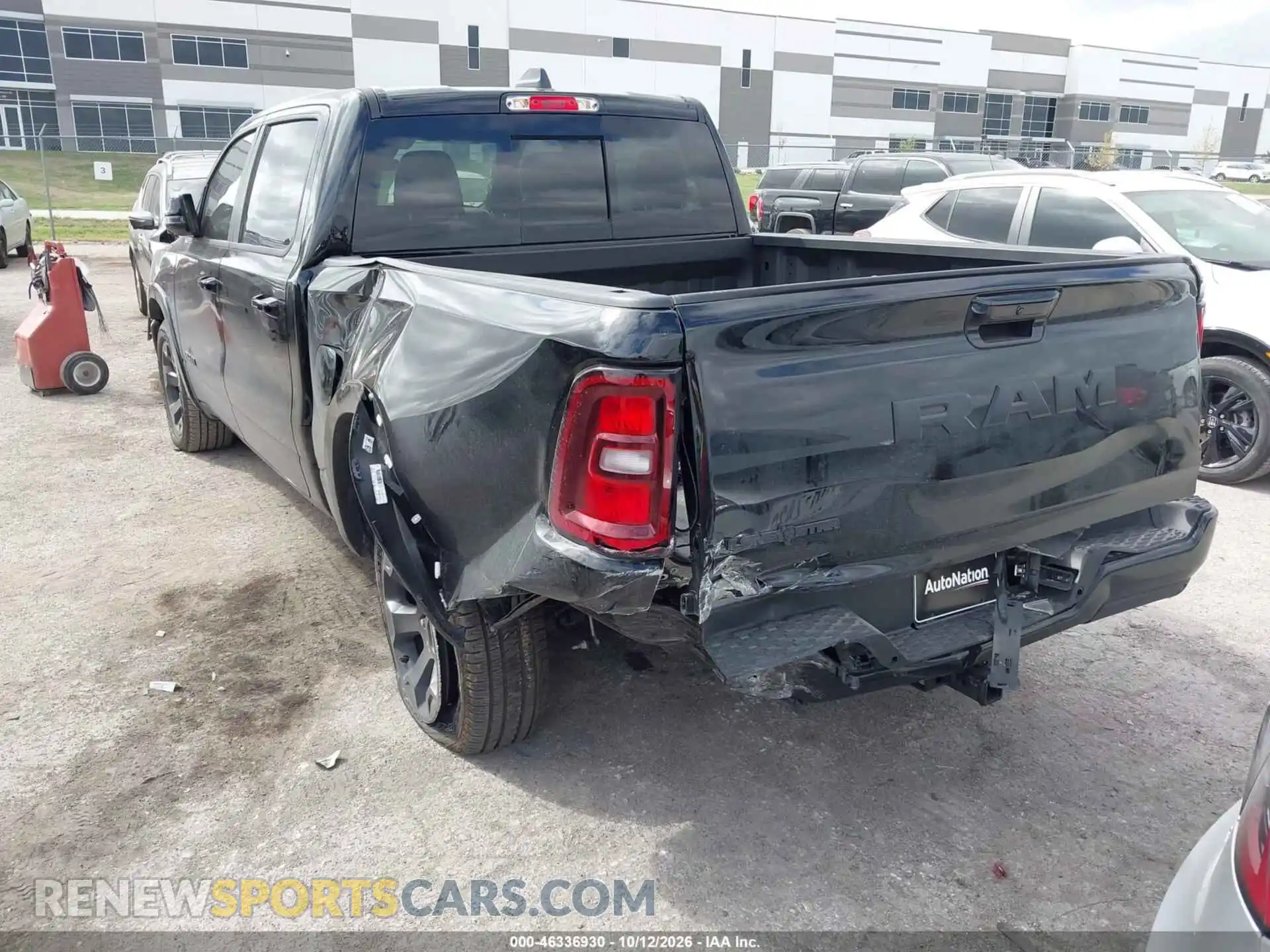 3 Photograph of a damaged car 3C6RREFG0T4187781 RAM 1500 2026