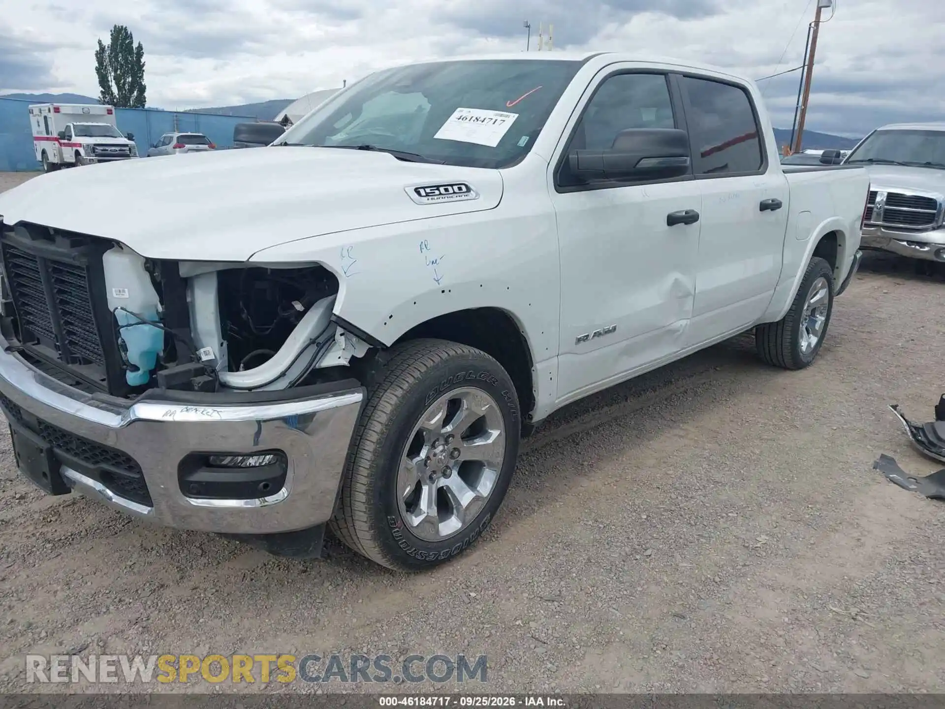 2 Photograph of a damaged car 3C6SRFFP3T4159383 RAM 1500 2026