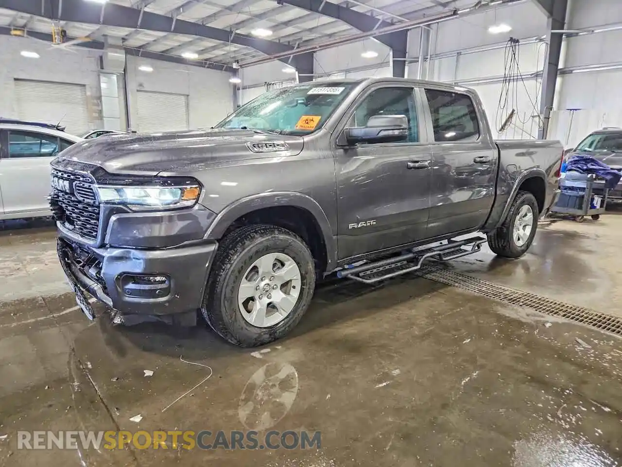 1 Photograph of a damaged car 3C6SRFFP6T4154307 RAM 1500 2026
