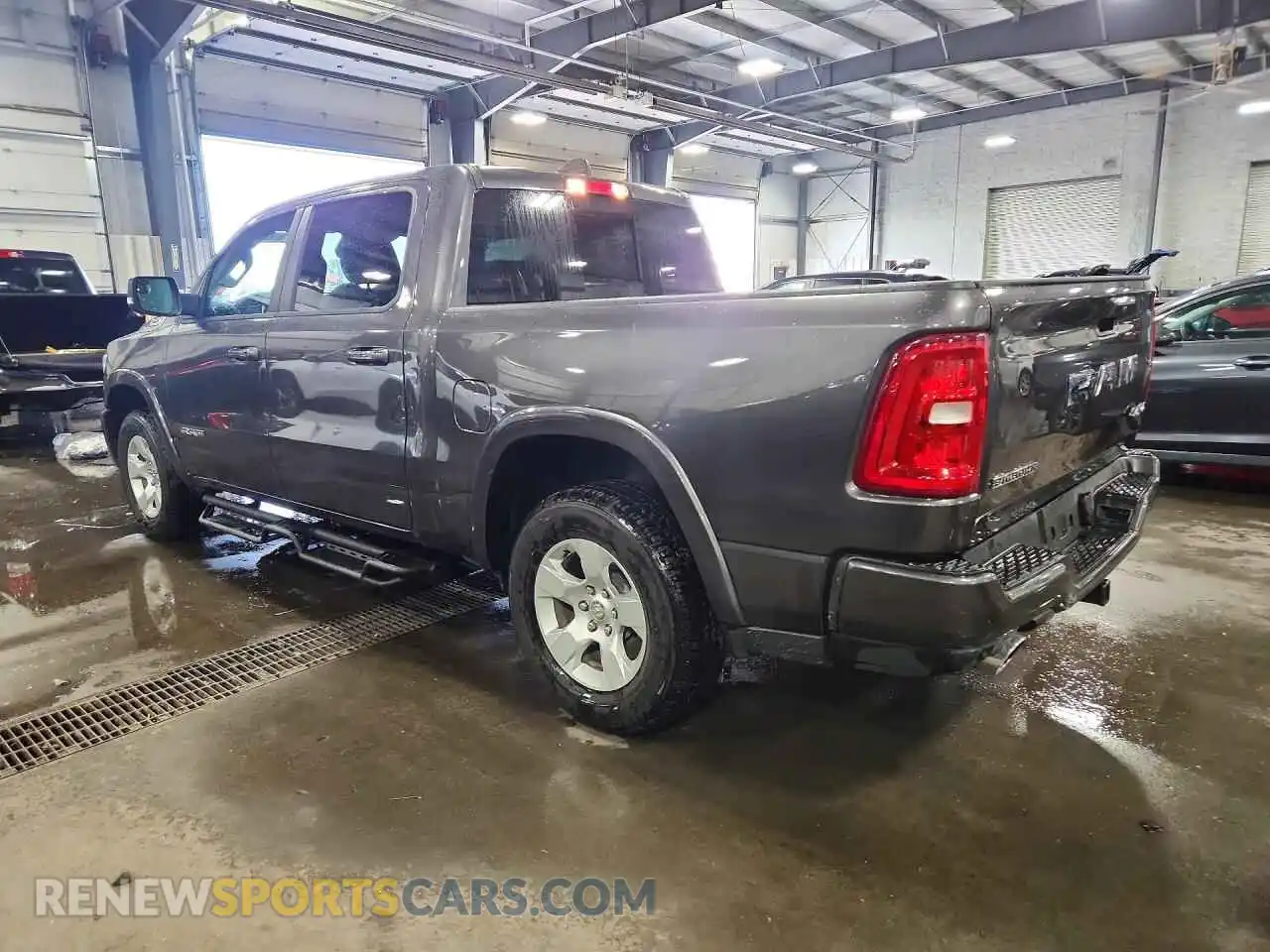 2 Photograph of a damaged car 3C6SRFFP6T4154307 RAM 1500 2026
