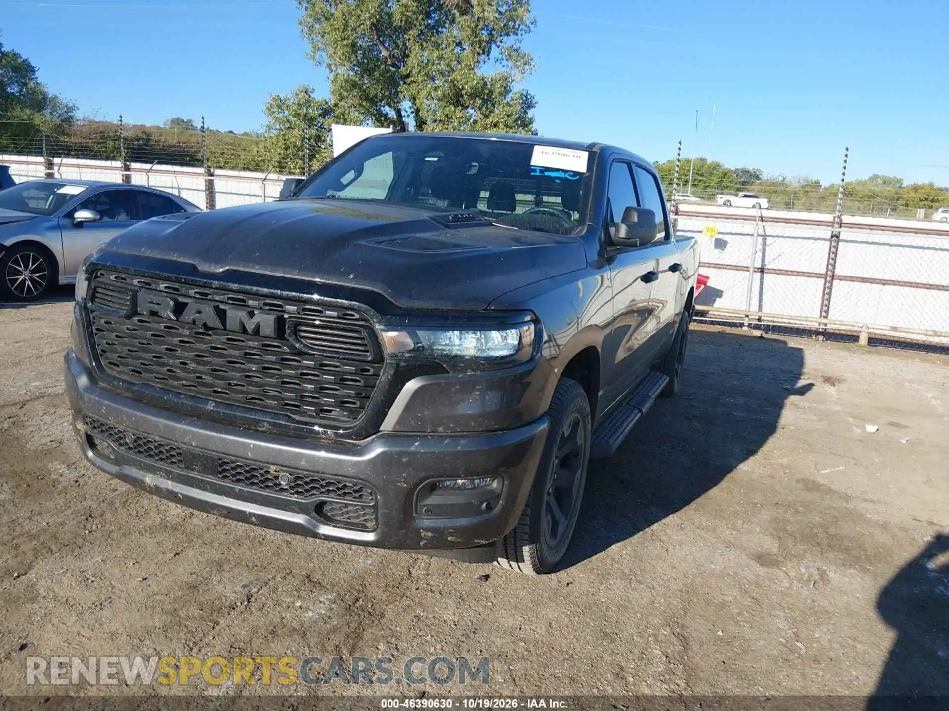 2 Photograph of a damaged car 3C6SRFGP0T4161977 RAM 1500 2026