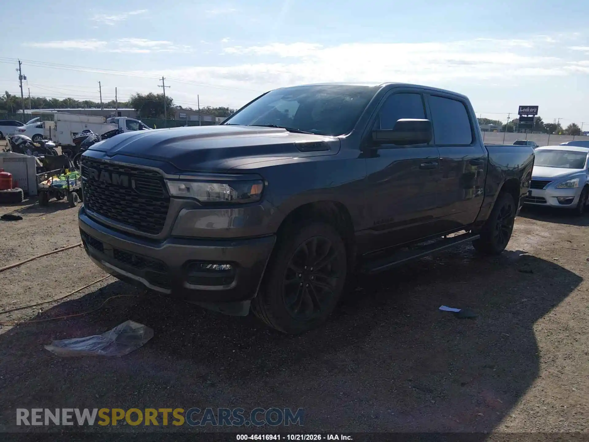 2 Photograph of a damaged car 3C6SRFGP6T4172031 RAM 1500 2026