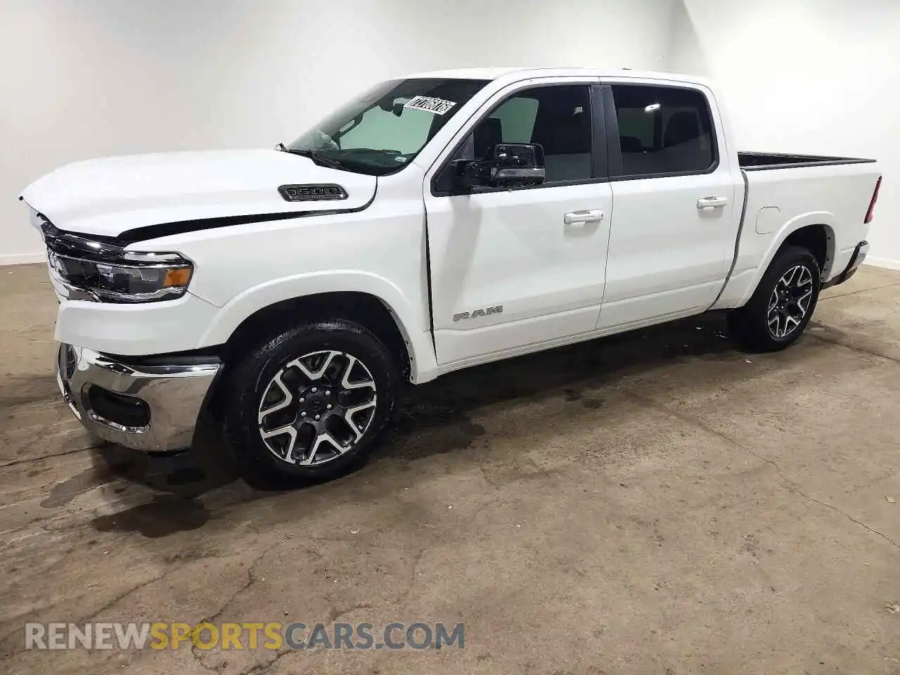 1 Photograph of a damaged car 3C6SRFJP1T4202335 RAM 1500 2026