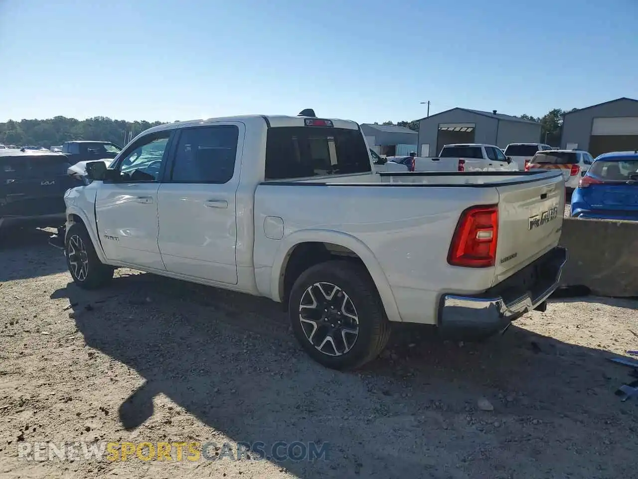 2 Photograph of a damaged car 3C6SRFJP2T4175131 RAM 1500 2026