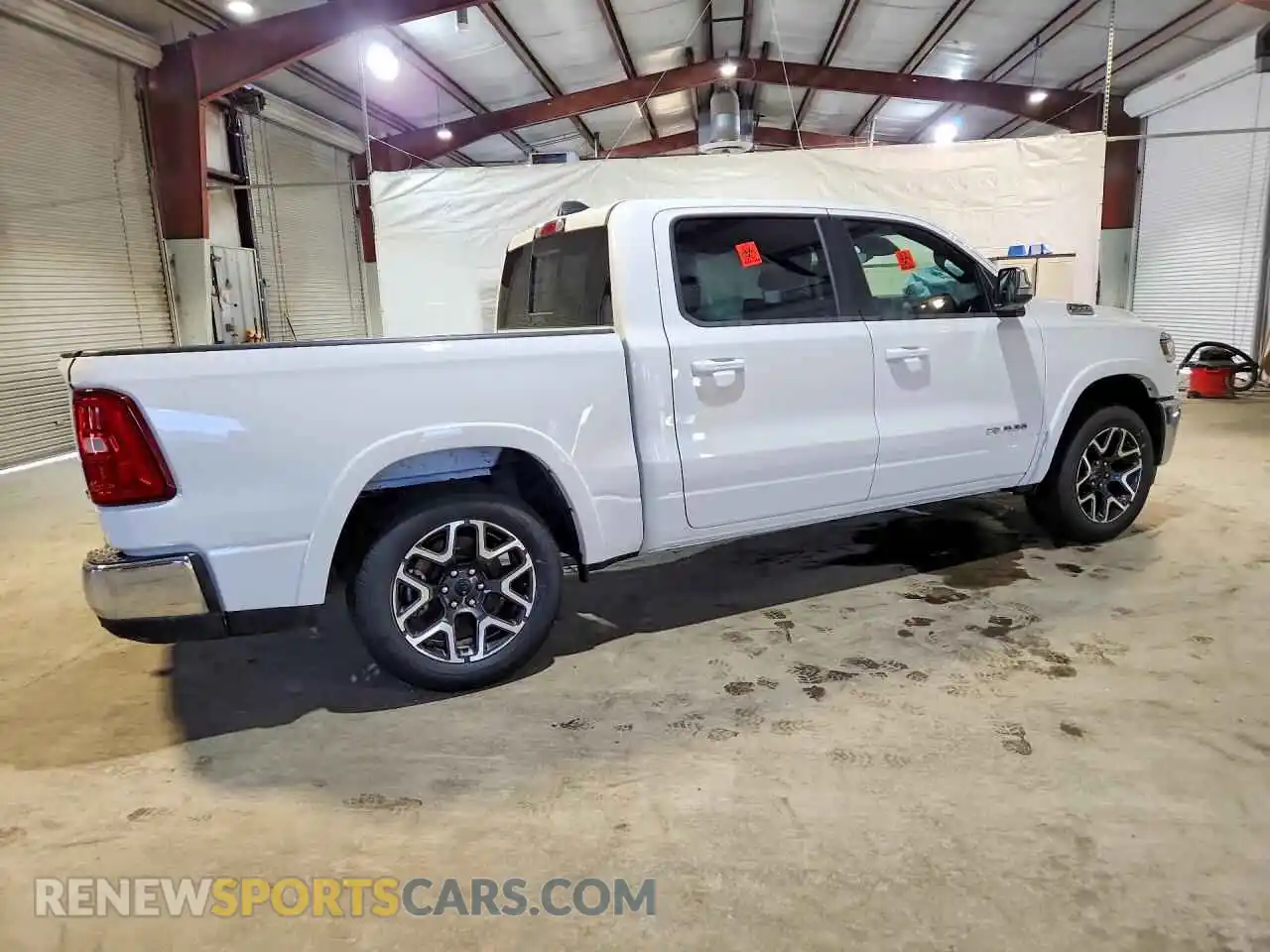 3 Photograph of a damaged car 3C6SRFJP5T4177083 RAM 1500 2026