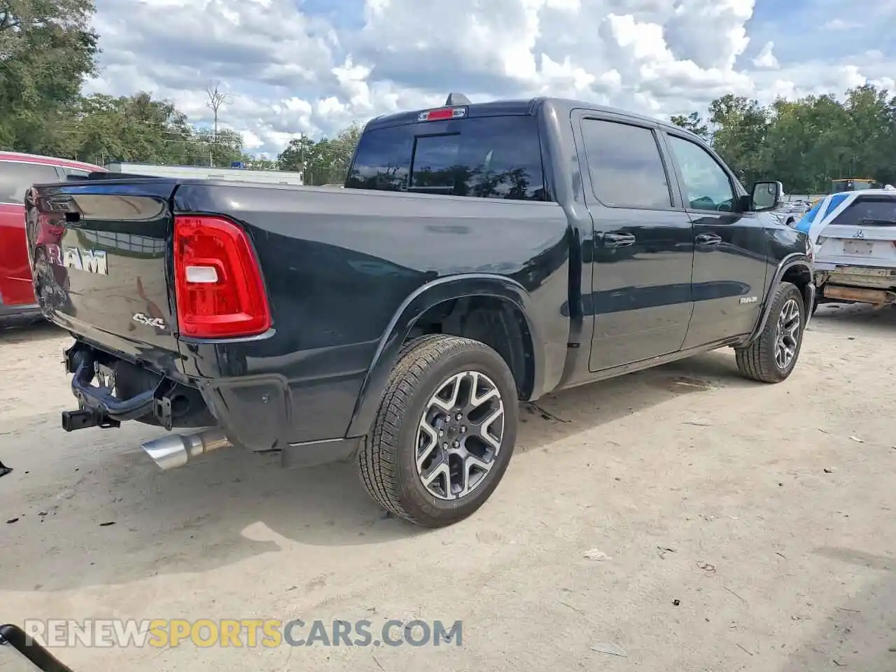 3 Photograph of a damaged car 3C6SRFJP9T4164319 RAM 1500 2026