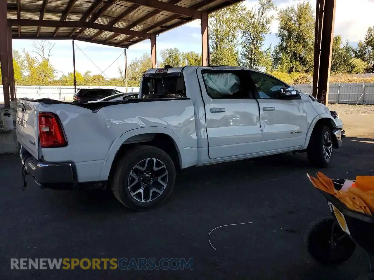 3 Фотография поврежденного автомобиля 3C6SRFJPXT4177290 RAM 1500 2026