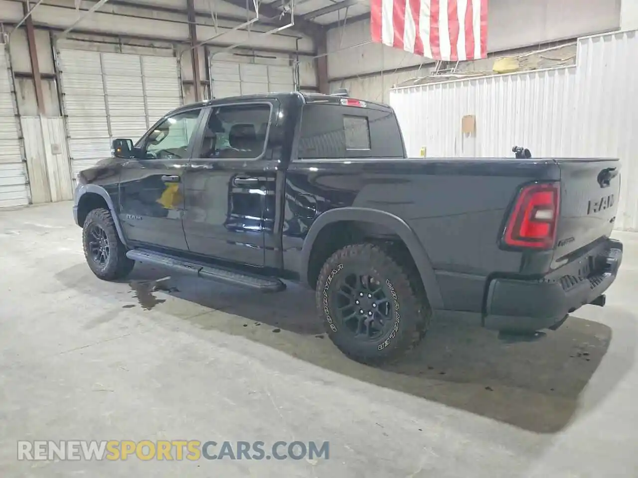 2 Photograph of a damaged car 3C6SRFLP3T4196471 RAM 1500 2026