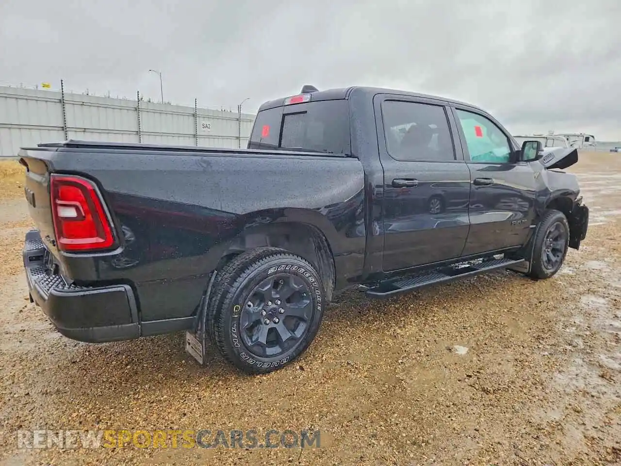 3 Photograph of a damaged car 3C6SRFVP0T4166406 RAM 1500 2026
