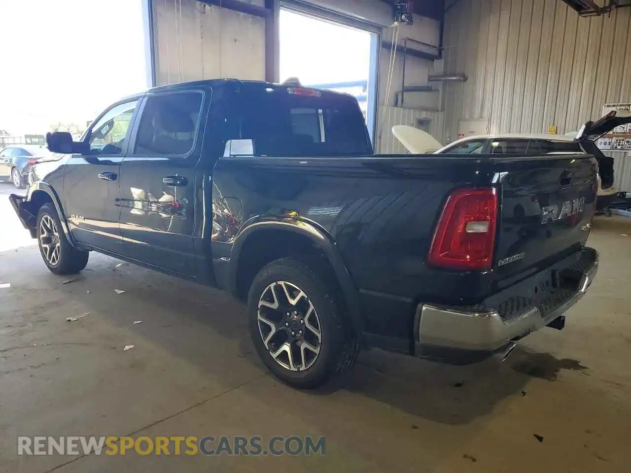 2 Photograph of a damaged car 1C6SRFJP8VN565398 RAM 1500 2027