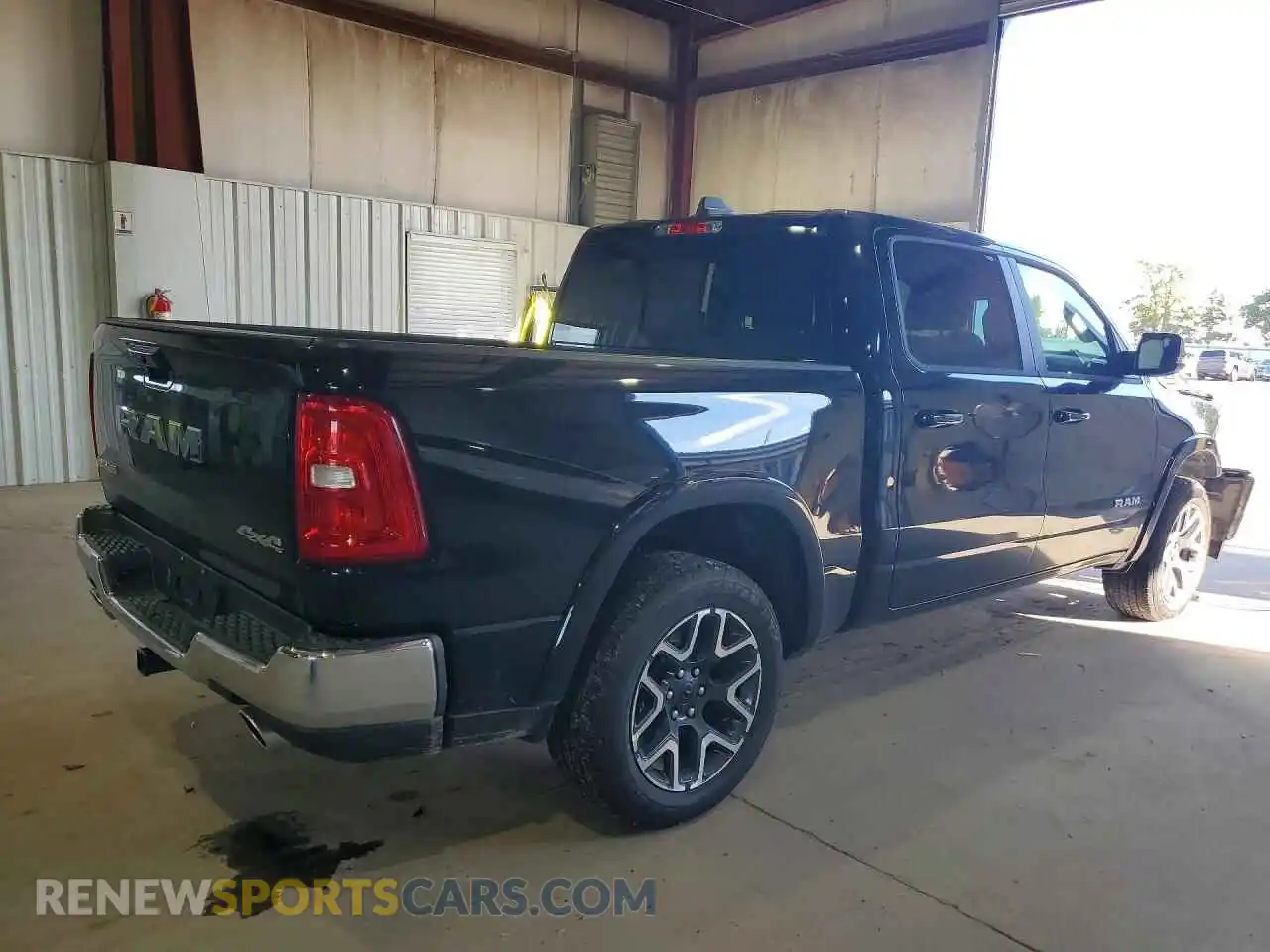 3 Photograph of a damaged car 1C6SRFJP8VN565398 RAM 1500 2027