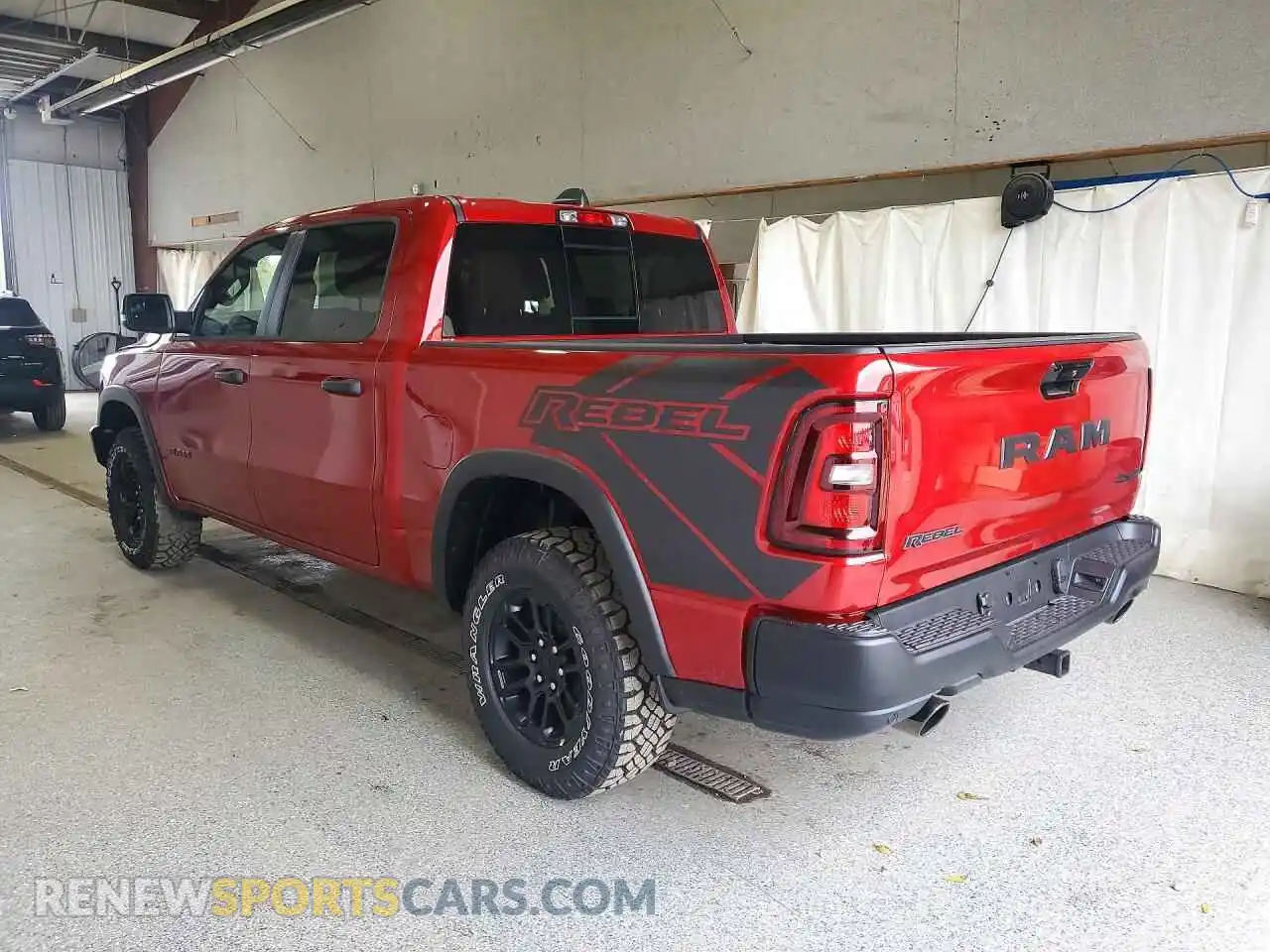 2 Photograph of a damaged car 1C6SRFLP1VN579558 RAM 1500 2027