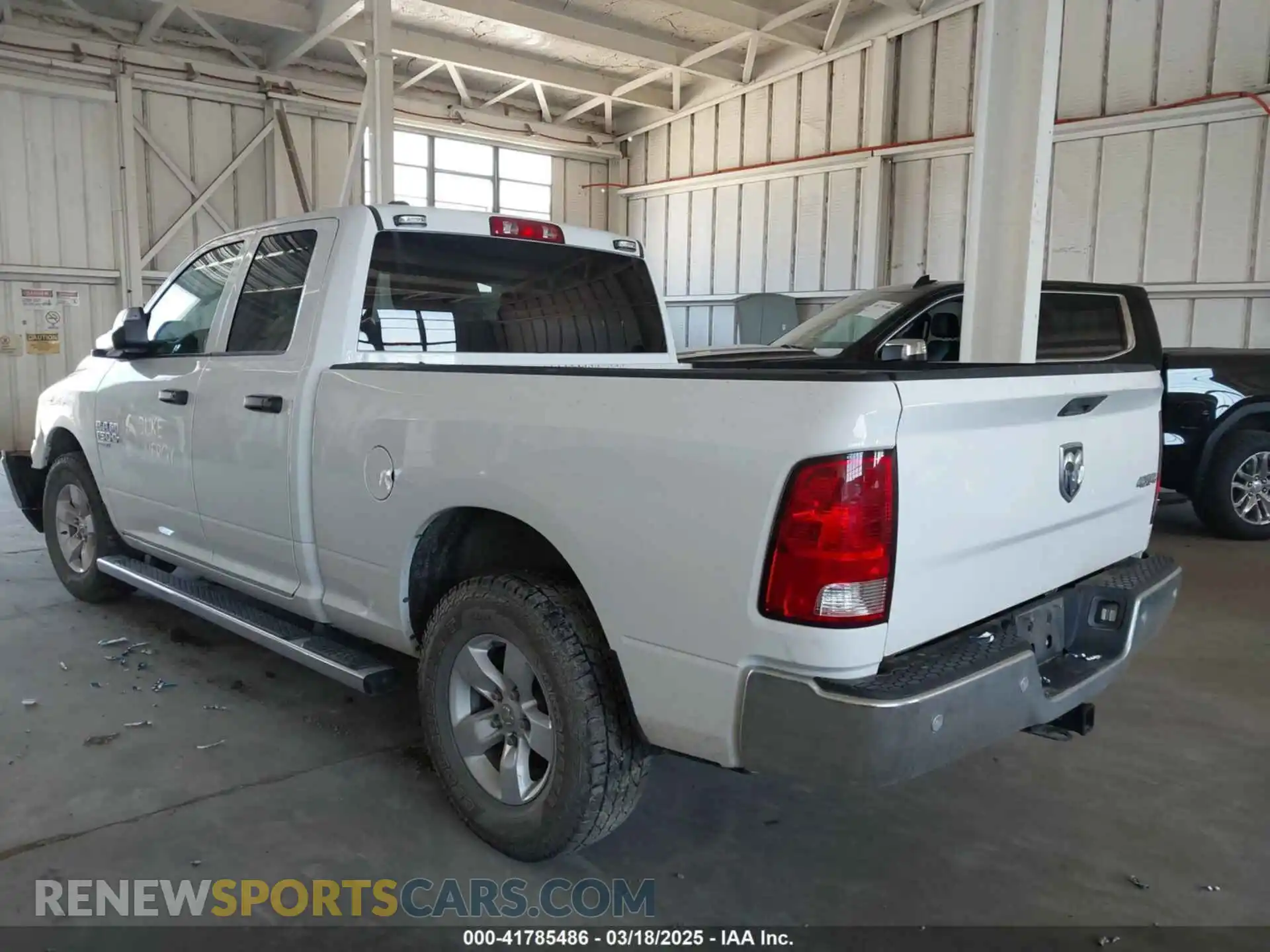 3 Photograph of a damaged car 1C6RR7FG1PS589091 RAM 1500 CLASSIC 2023
