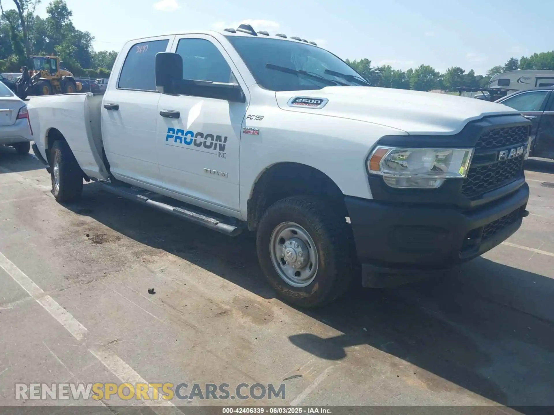1 Photograph of a damaged car 3C6UR5CJ6KG556859 RAM 2500 2019