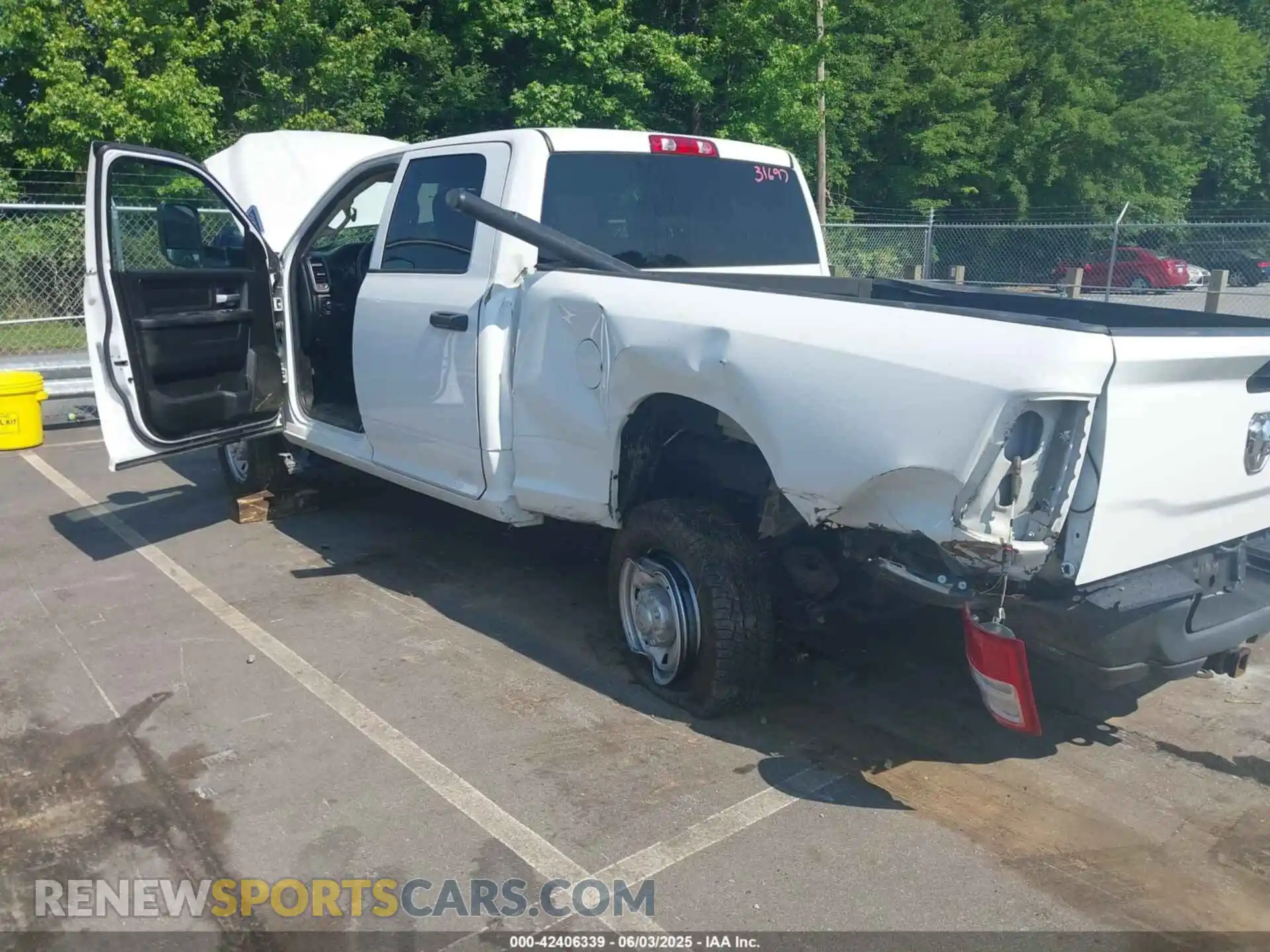 3 Photograph of a damaged car 3C6UR5CJ6KG556859 RAM 2500 2019