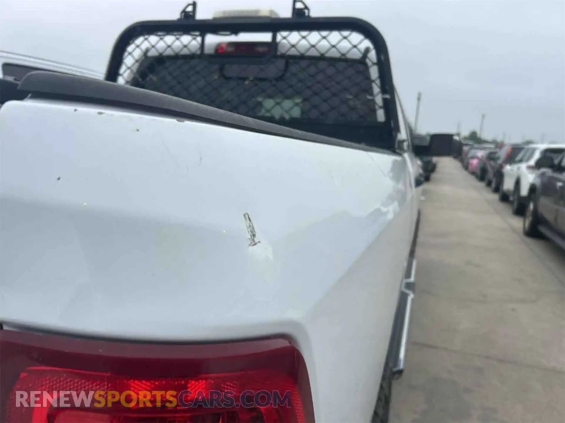 3 Photograph of a damaged car 3C6UR5CL4KG598108 RAM 2500 2019