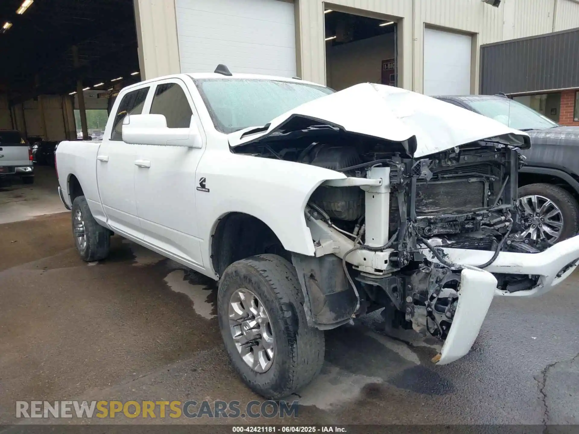 1 Photograph of a damaged car 3C6UR5CL5KG656100 RAM 2500 2019
