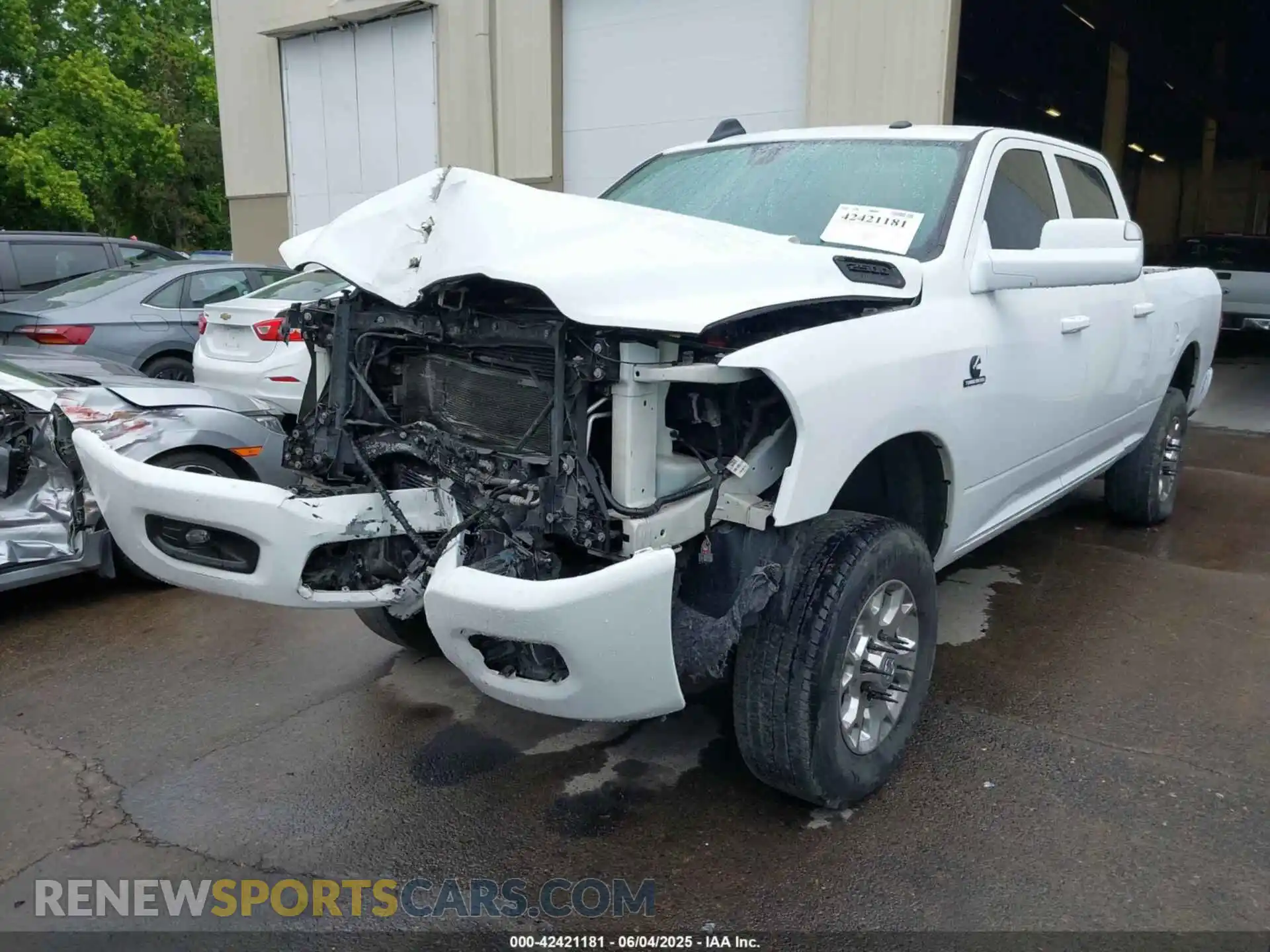 2 Photograph of a damaged car 3C6UR5CL5KG656100 RAM 2500 2019