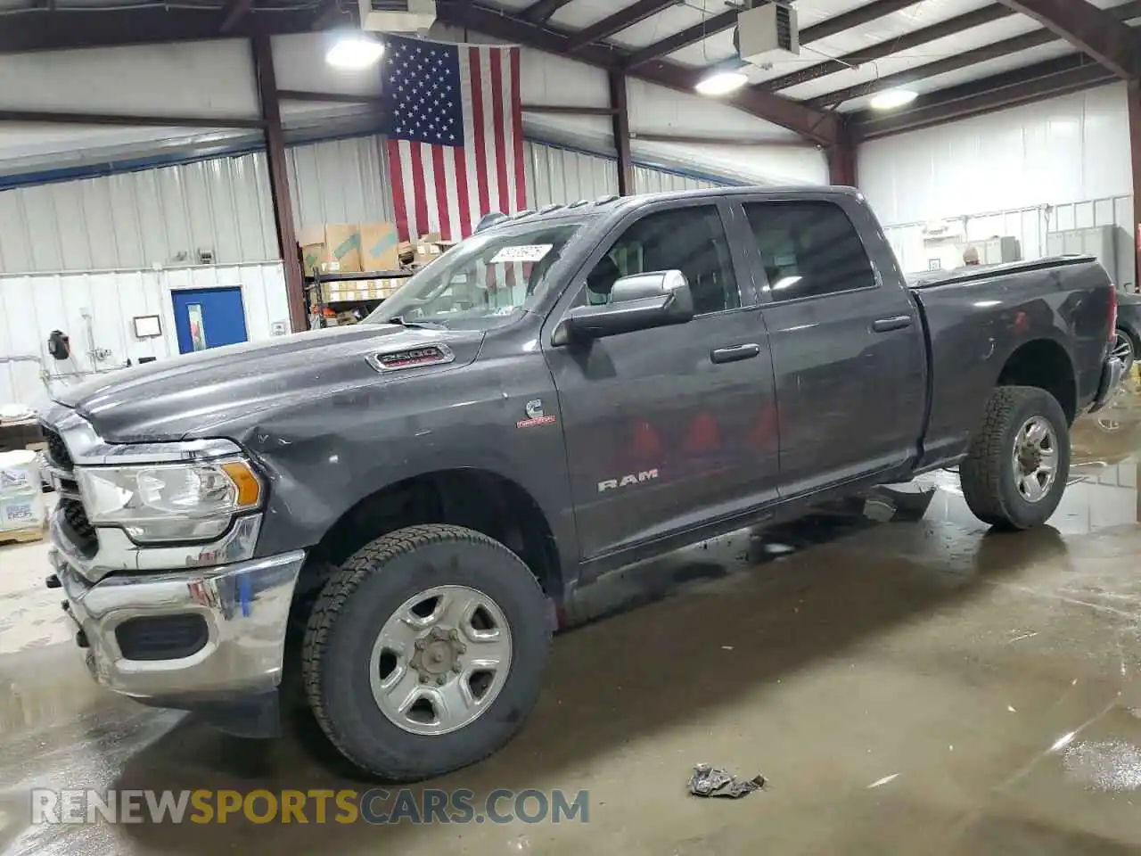 1 Photograph of a damaged car 3C6UR5CLXKG546160 RAM 2500 2019