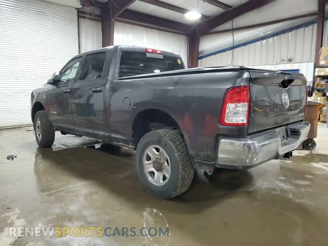 2 Photograph of a damaged car 3C6UR5CLXKG546160 RAM 2500 2019