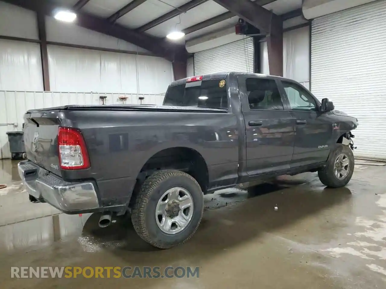 3 Photograph of a damaged car 3C6UR5CLXKG546160 RAM 2500 2019