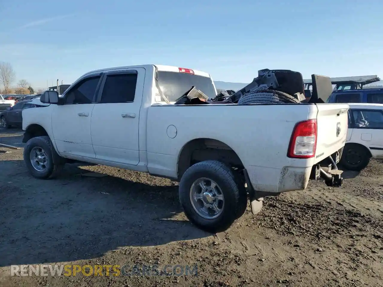 2 Photograph of a damaged car 3C6UR5DL1KG586285 RAM 2500 2019