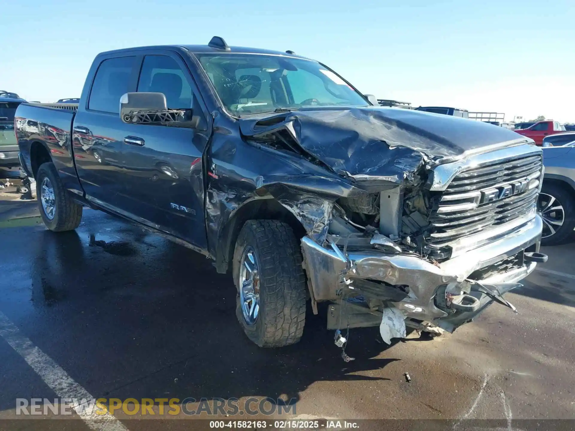 1 Photograph of a damaged car 3C6UR5DL3KG519364 RAM 2500 2019