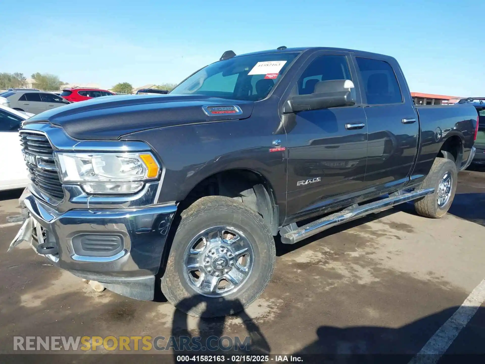 2 Photograph of a damaged car 3C6UR5DL3KG519364 RAM 2500 2019
