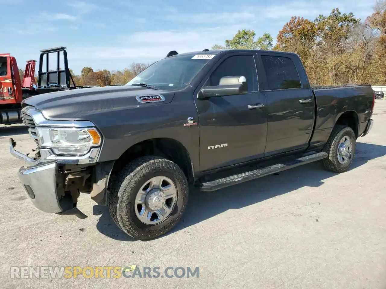 1 Photograph of a damaged car 3C6UR5DL3KG519462 RAM 2500 2019