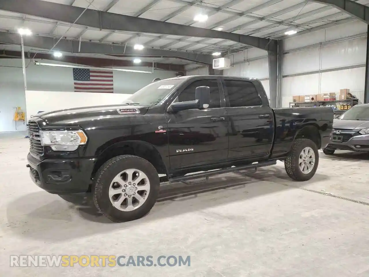 1 Photograph of a damaged car 3C6UR5DL3KG559475 RAM 2500 2019