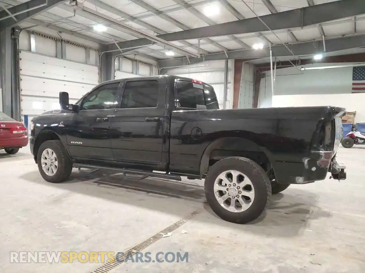 2 Photograph of a damaged car 3C6UR5DL3KG559475 RAM 2500 2019