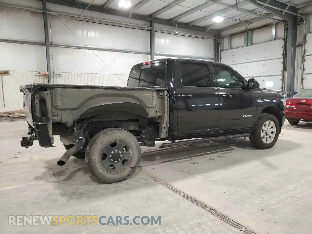 3 Photograph of a damaged car 3C6UR5DL3KG559475 RAM 2500 2019