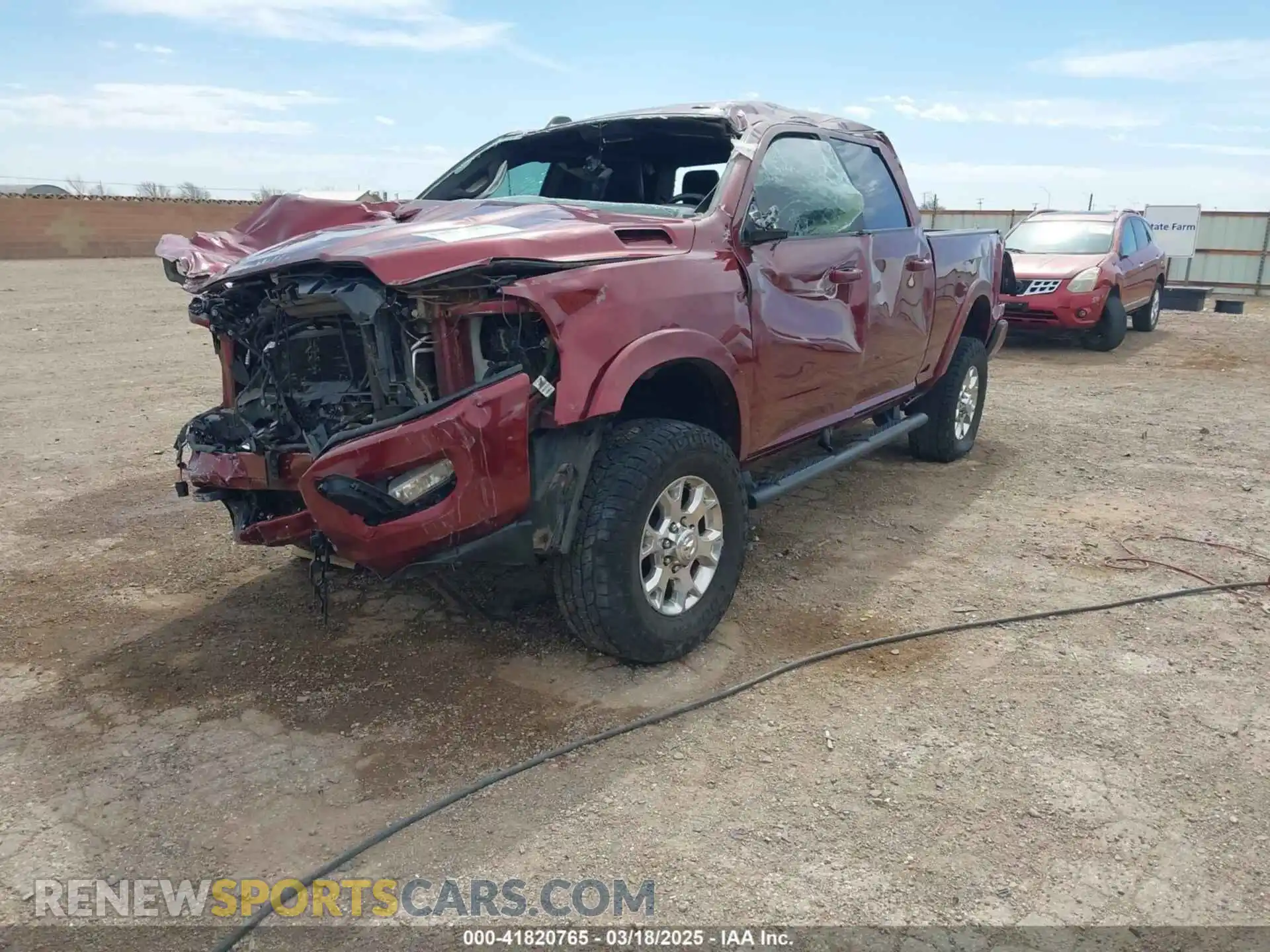 2 Photograph of a damaged car 3C6UR5FL1KG615300 RAM 2500 2019