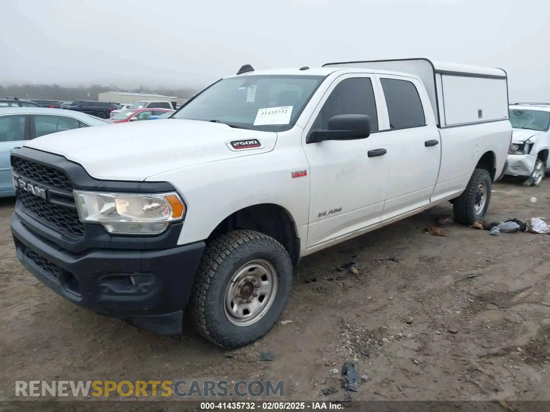 2 Photograph of a damaged car 3C6UR5HJ8KG600868 RAM 2500 2019