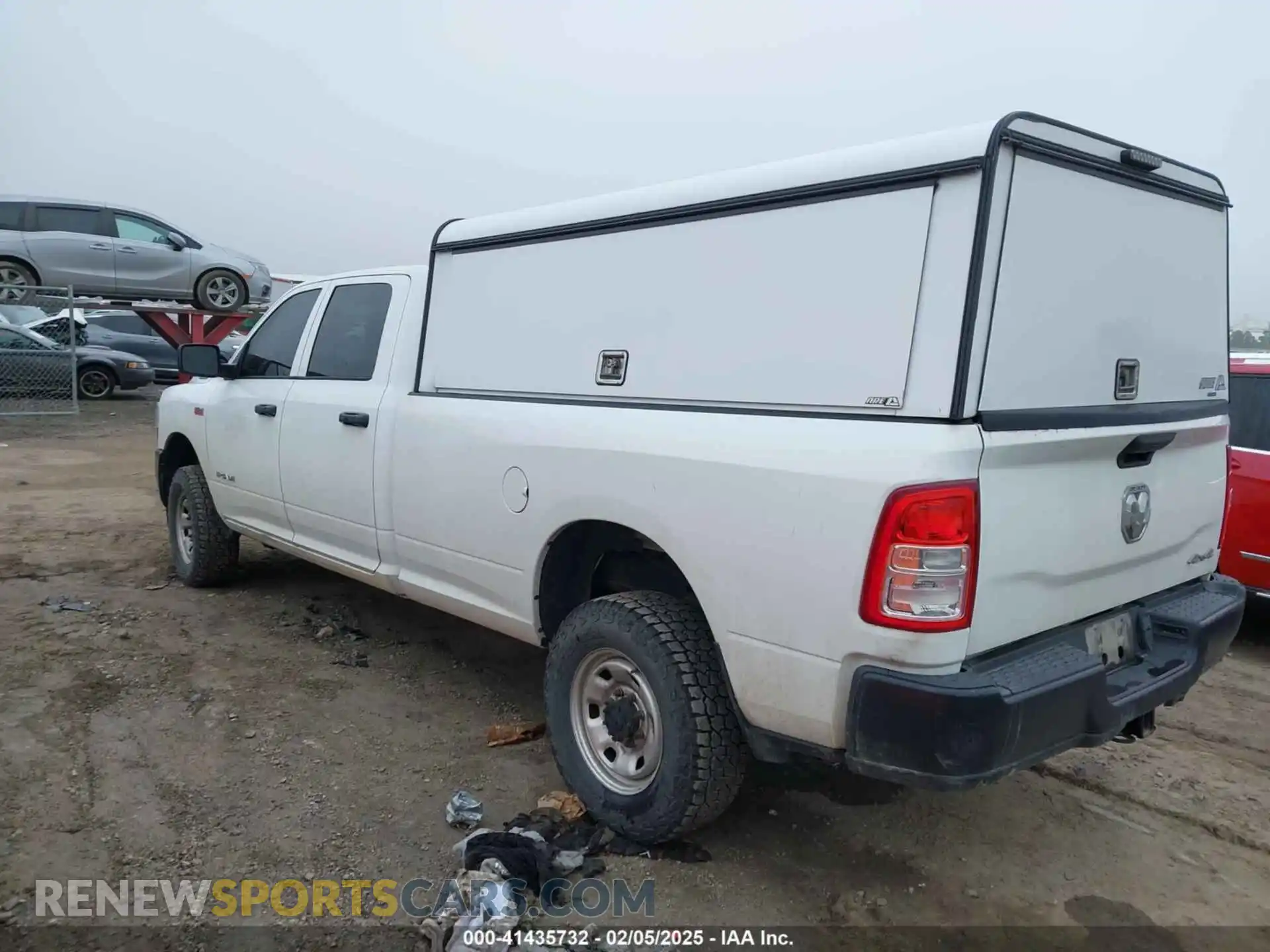 3 Photograph of a damaged car 3C6UR5HJ8KG600868 RAM 2500 2019