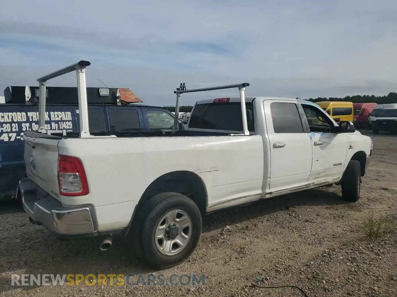 3 Photograph of a damaged car 3C6UR5JL1KG519237 RAM 2500 2019