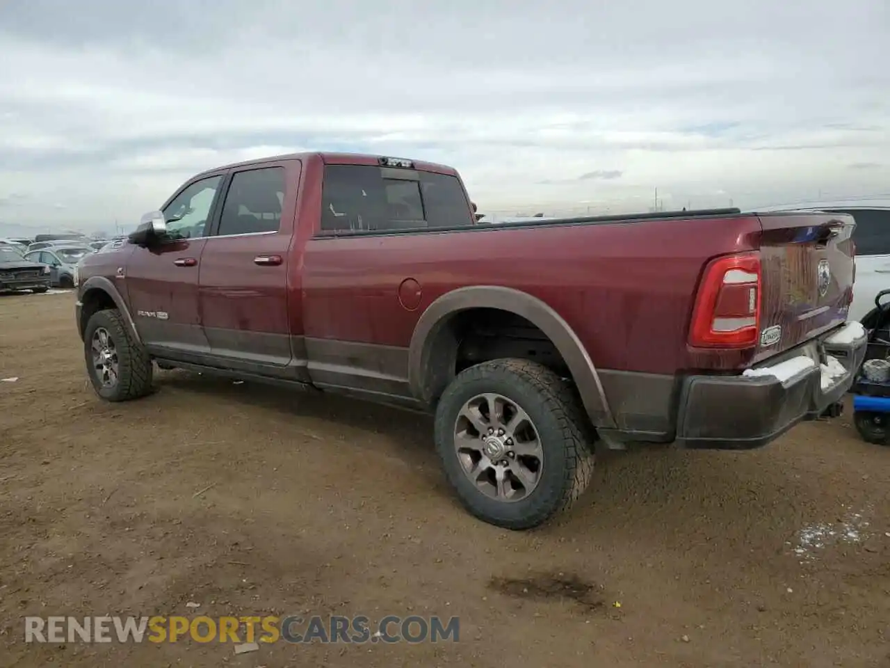2 Photograph of a damaged car 3C6UR5LL4KG661577 RAM 2500 2019