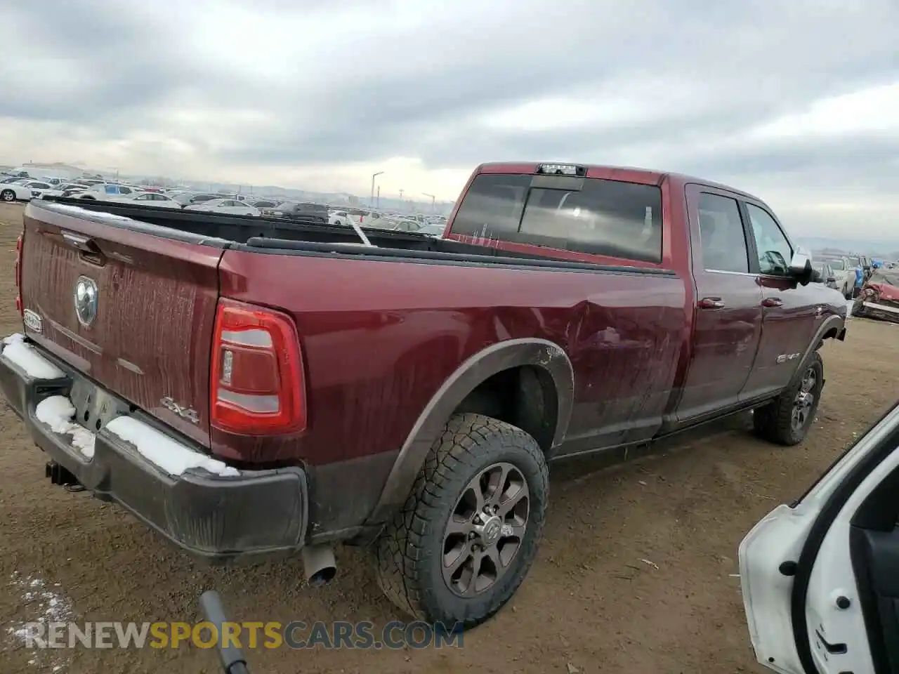 3 Photograph of a damaged car 3C6UR5LL4KG661577 RAM 2500 2019